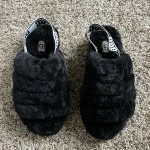 Black UGG slippers. Size 6